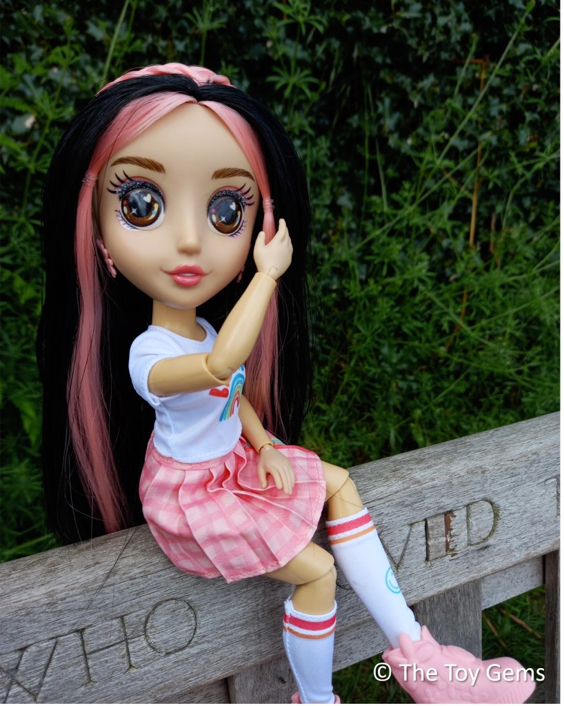 BKind Nora Doll on Bench.